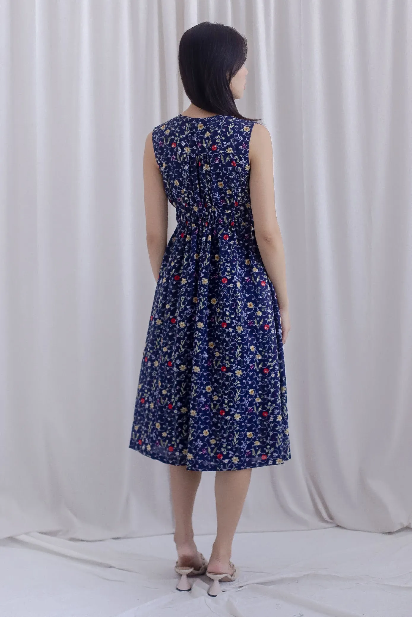 Isla Floral Eyelet Empire Waist Buttons Dress In Navy Blue