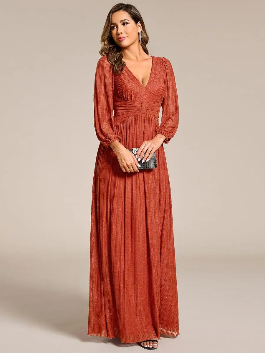 Robe de soirée trapèze à manches longues et taille empire scintillante