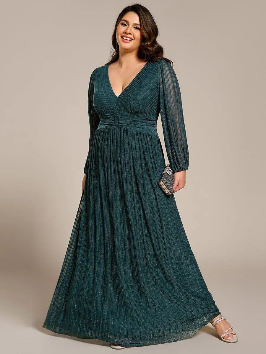 Robe de soirée trapèze à manches longues et taille empire scintillante