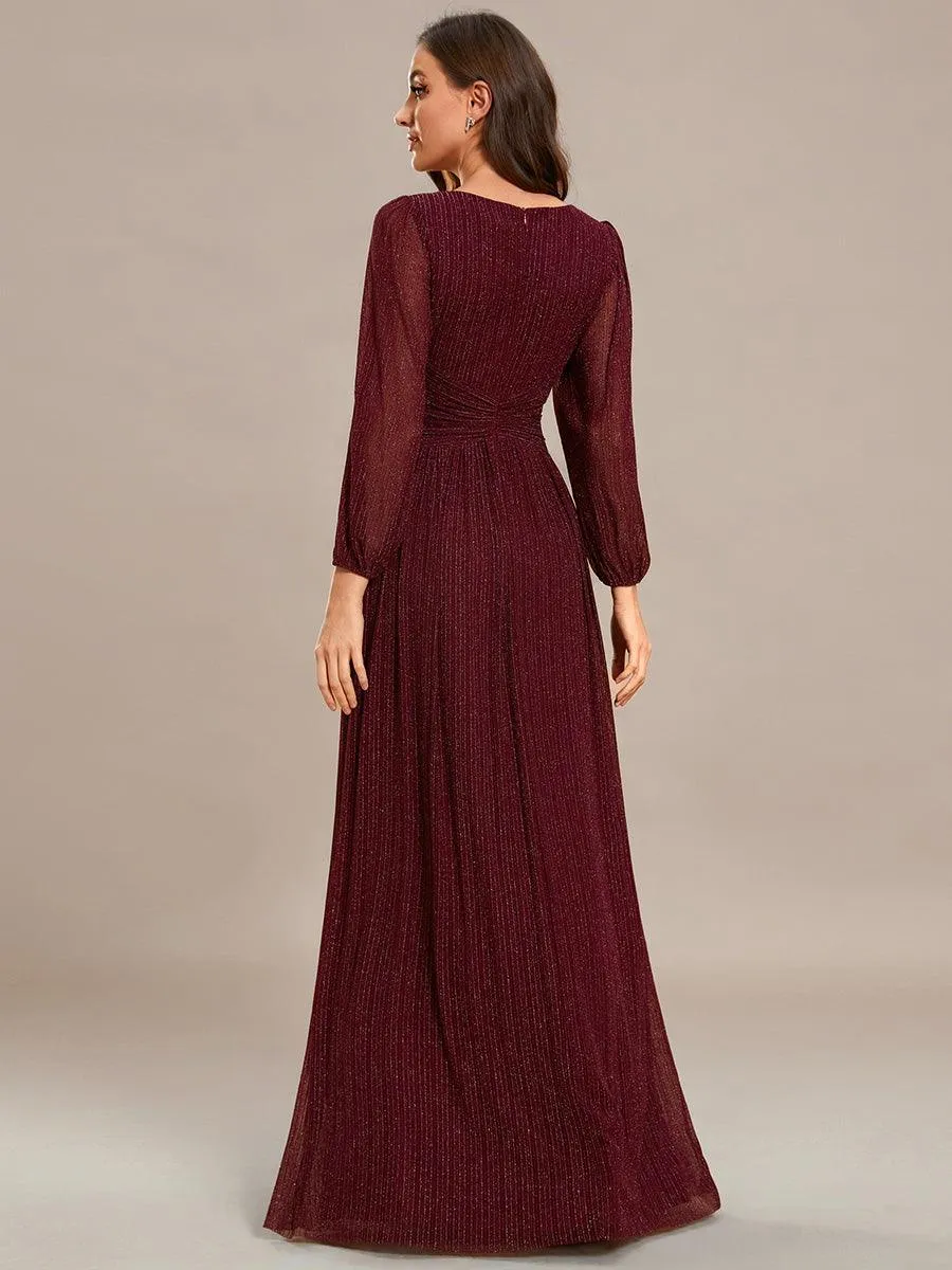Robe de soirée trapèze à manches longues et taille empire scintillante