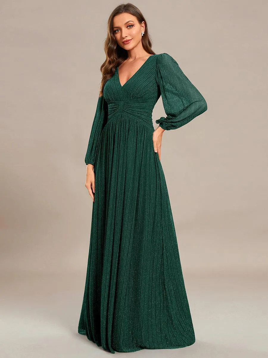 Robe de soirée trapèze à manches longues et taille empire scintillante