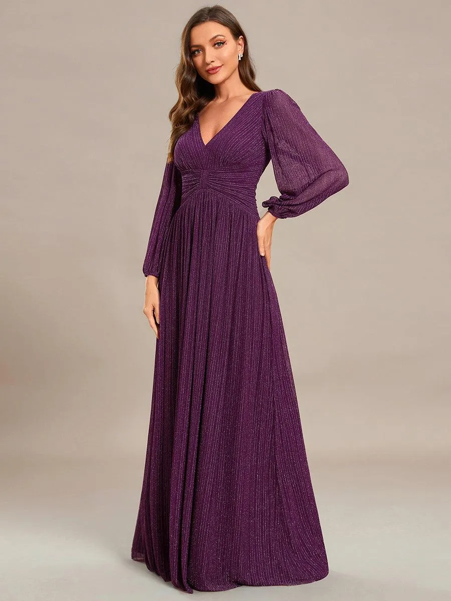 Robe de soirée trapèze à manches longues et taille empire scintillante