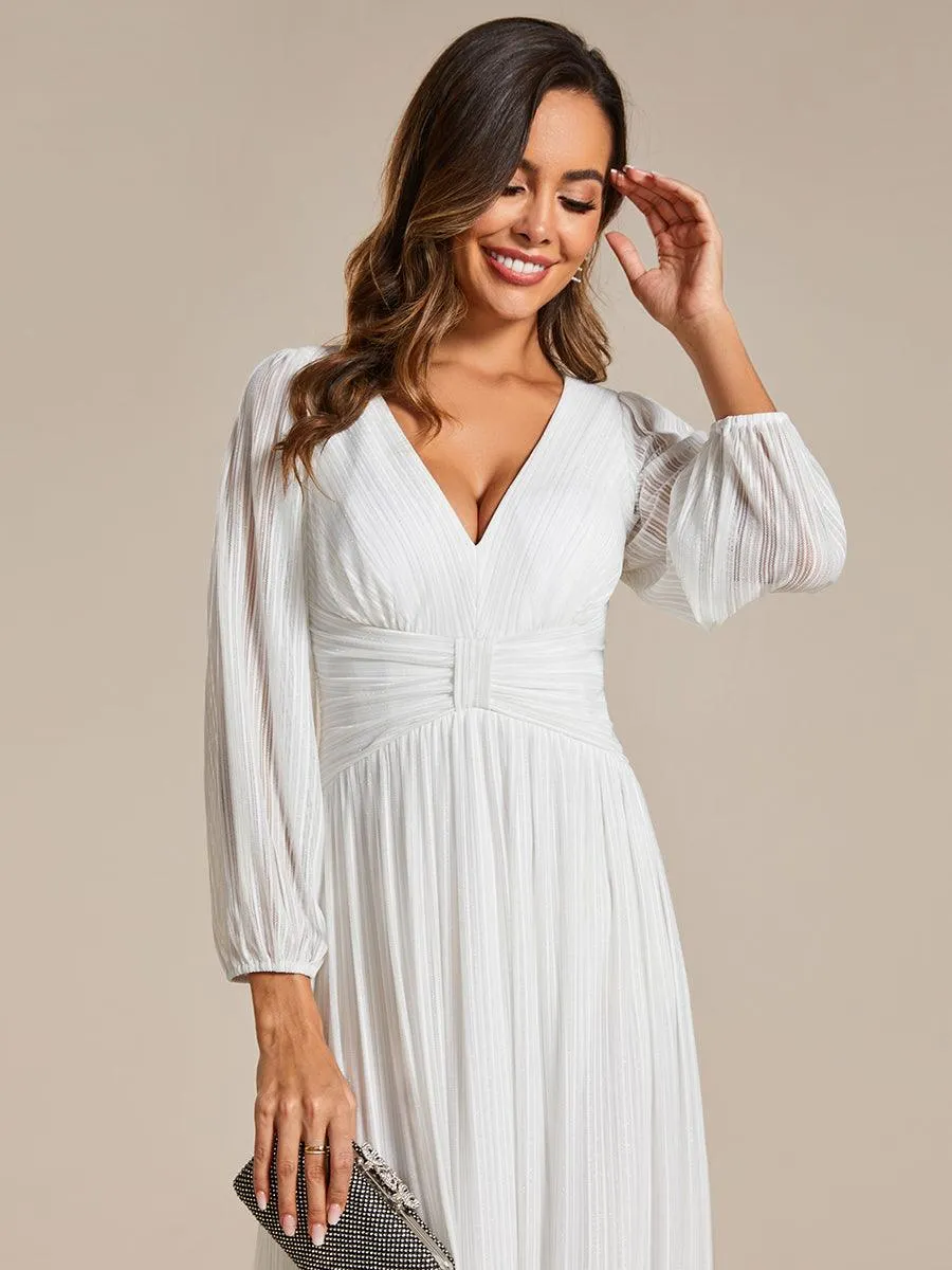 Robe de soirée trapèze à manches longues et taille empire scintillante