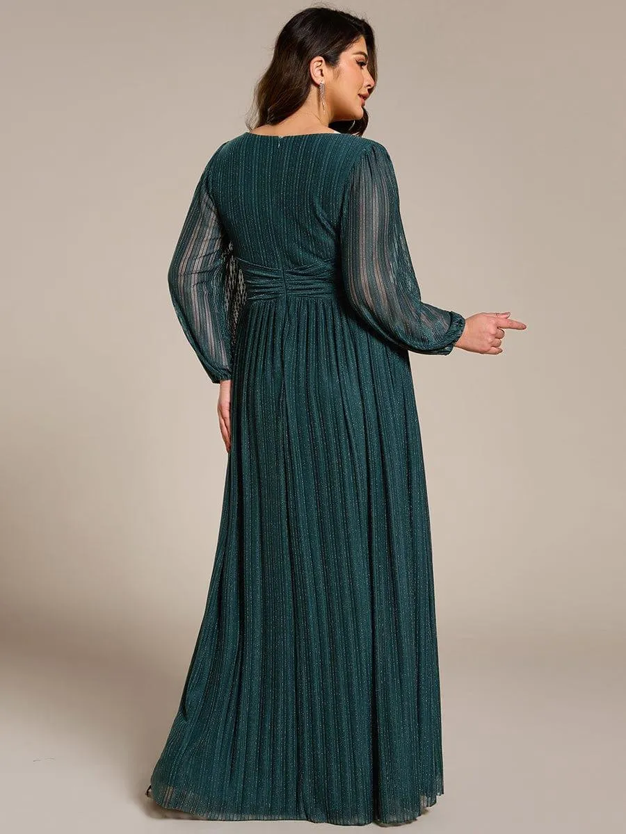 Robe de soirée trapèze à manches longues et taille empire scintillante