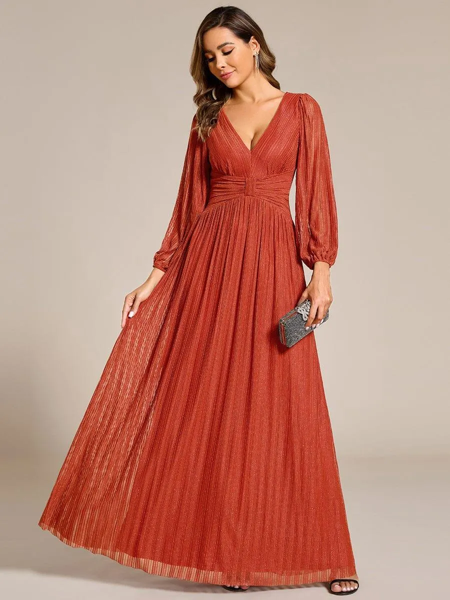 Robe de soirée trapèze à manches longues et taille empire scintillante