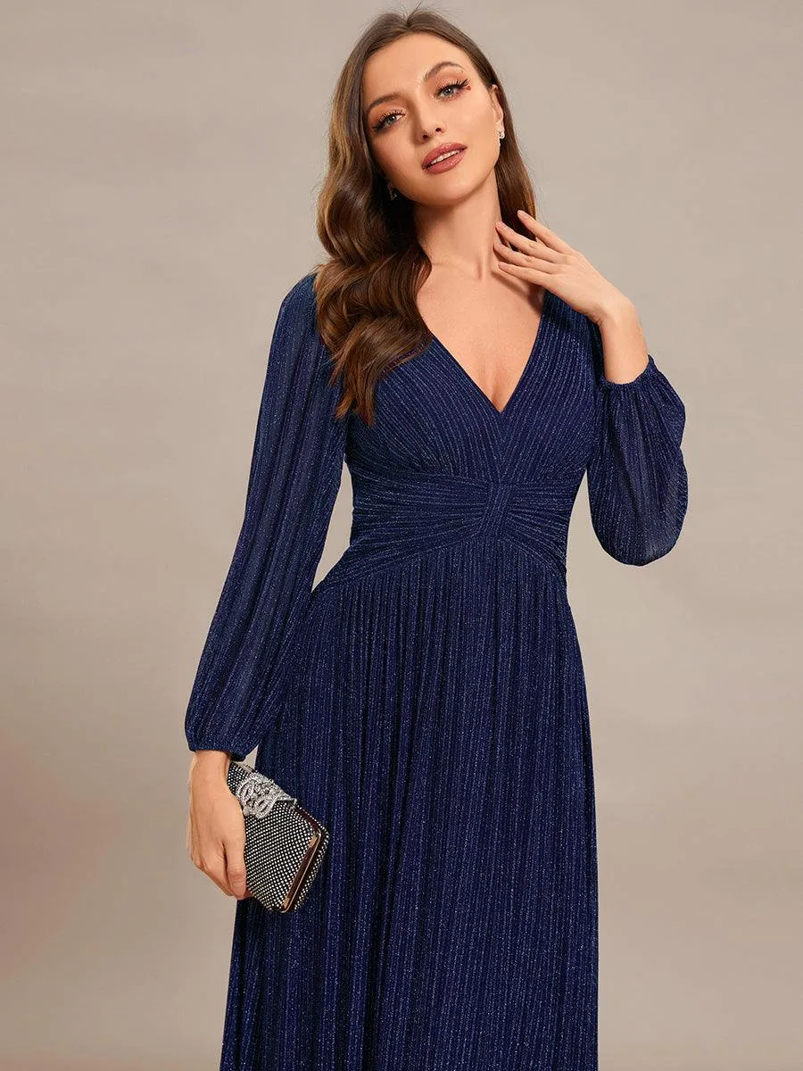 Robe de soirée trapèze à manches longues et taille empire scintillante