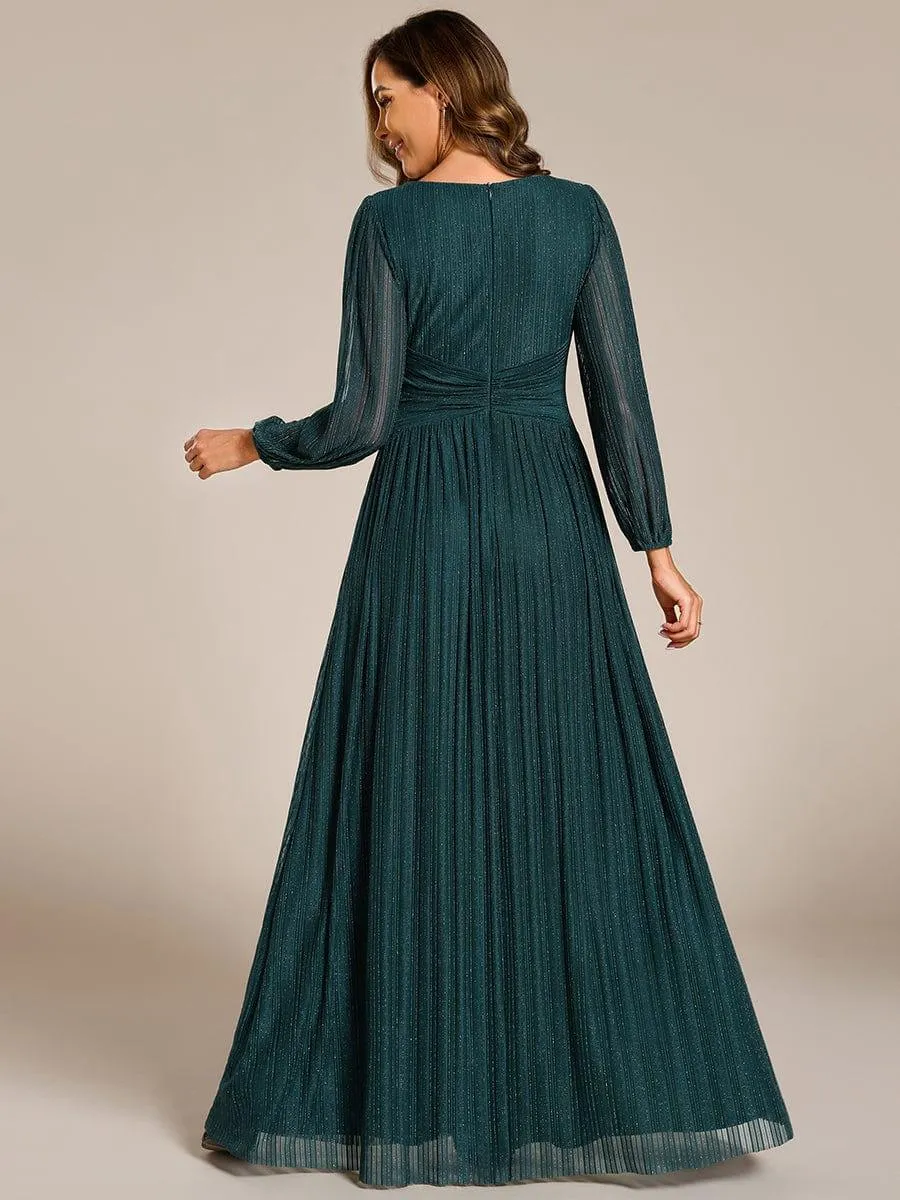 Robe de soirée trapèze à manches longues et taille empire scintillante