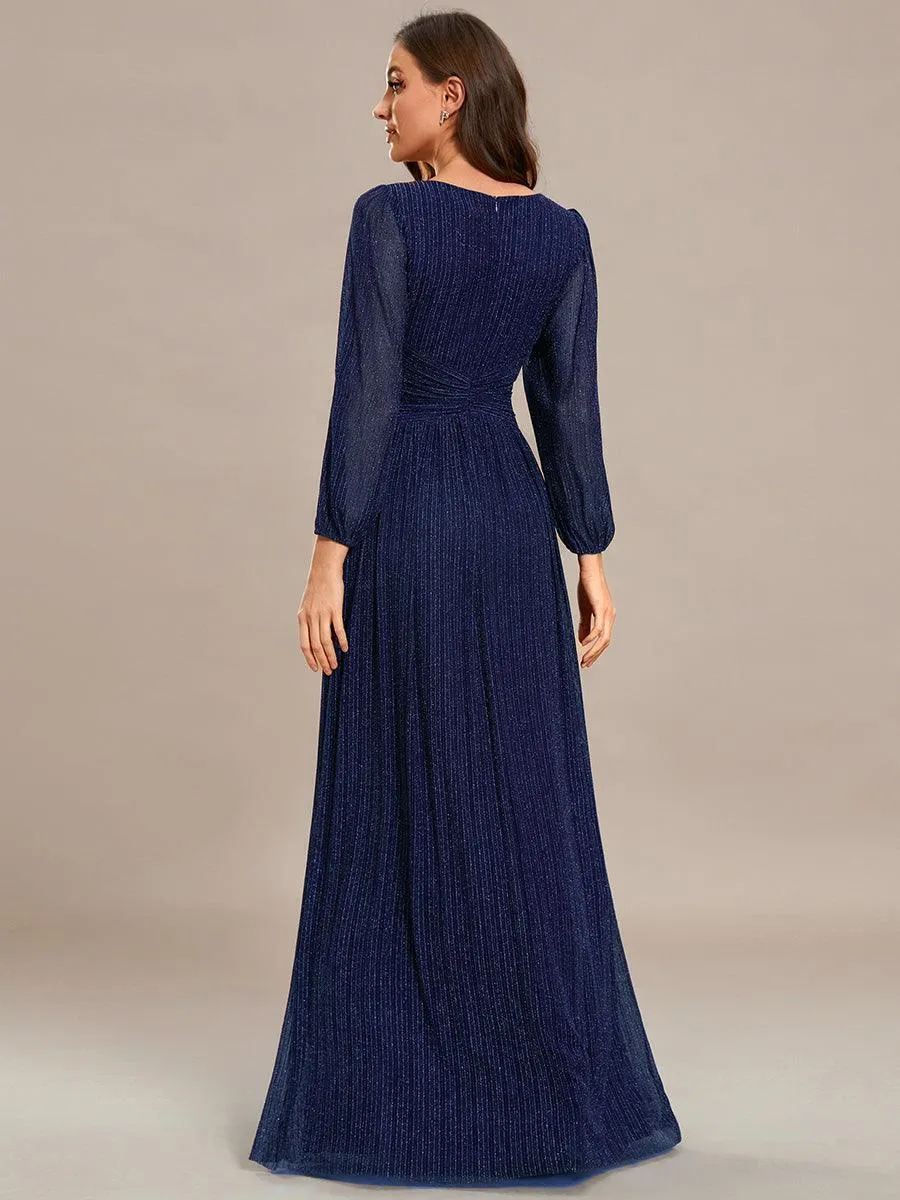 Robe de soirée trapèze à manches longues et taille empire scintillante
