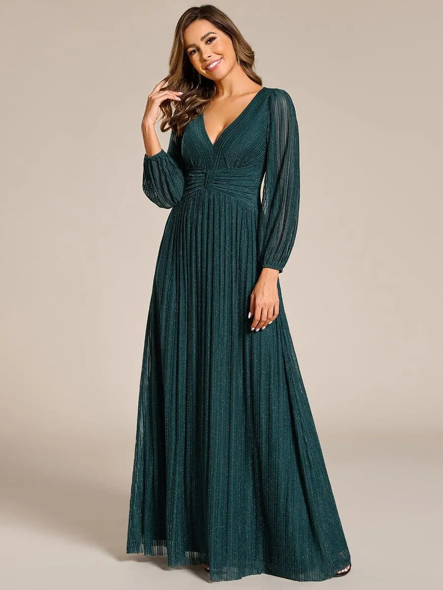 Robe de soirée trapèze à manches longues et taille empire scintillante