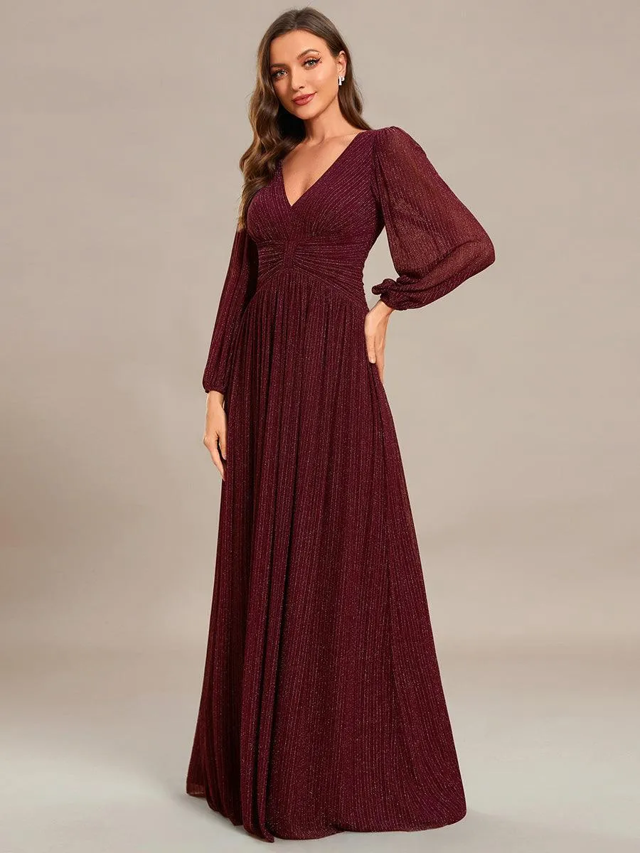 Robe de soirée trapèze à manches longues et taille empire scintillante