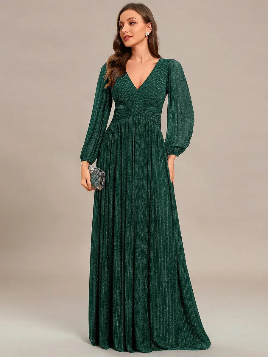 Robe de soirée trapèze à manches longues et taille empire scintillante