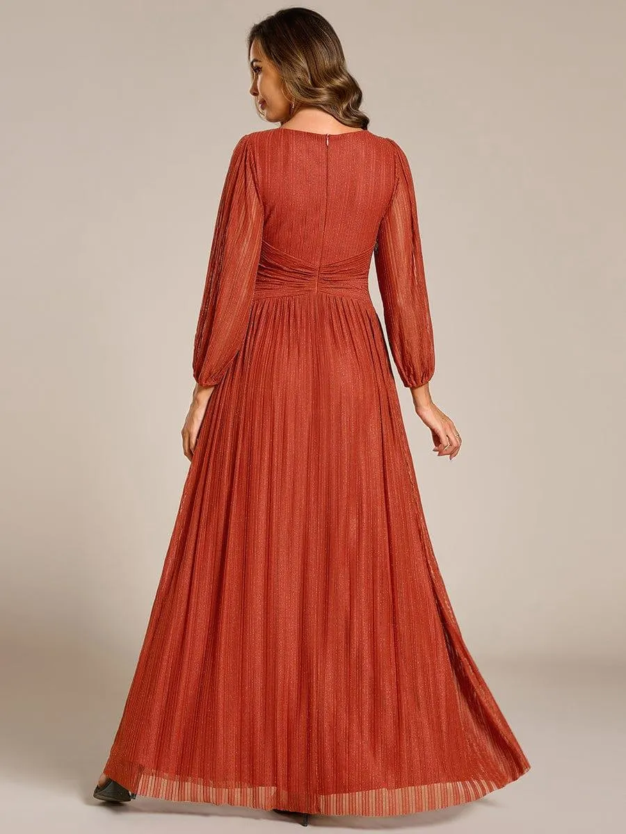 Robe de soirée trapèze à manches longues et taille empire scintillante