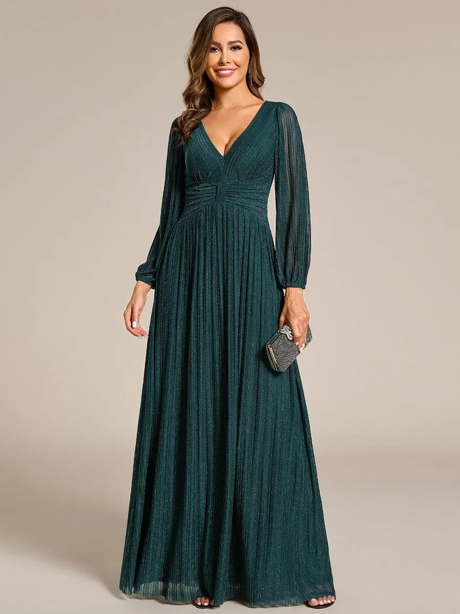 Robe de soirée trapèze à manches longues et taille empire scintillante