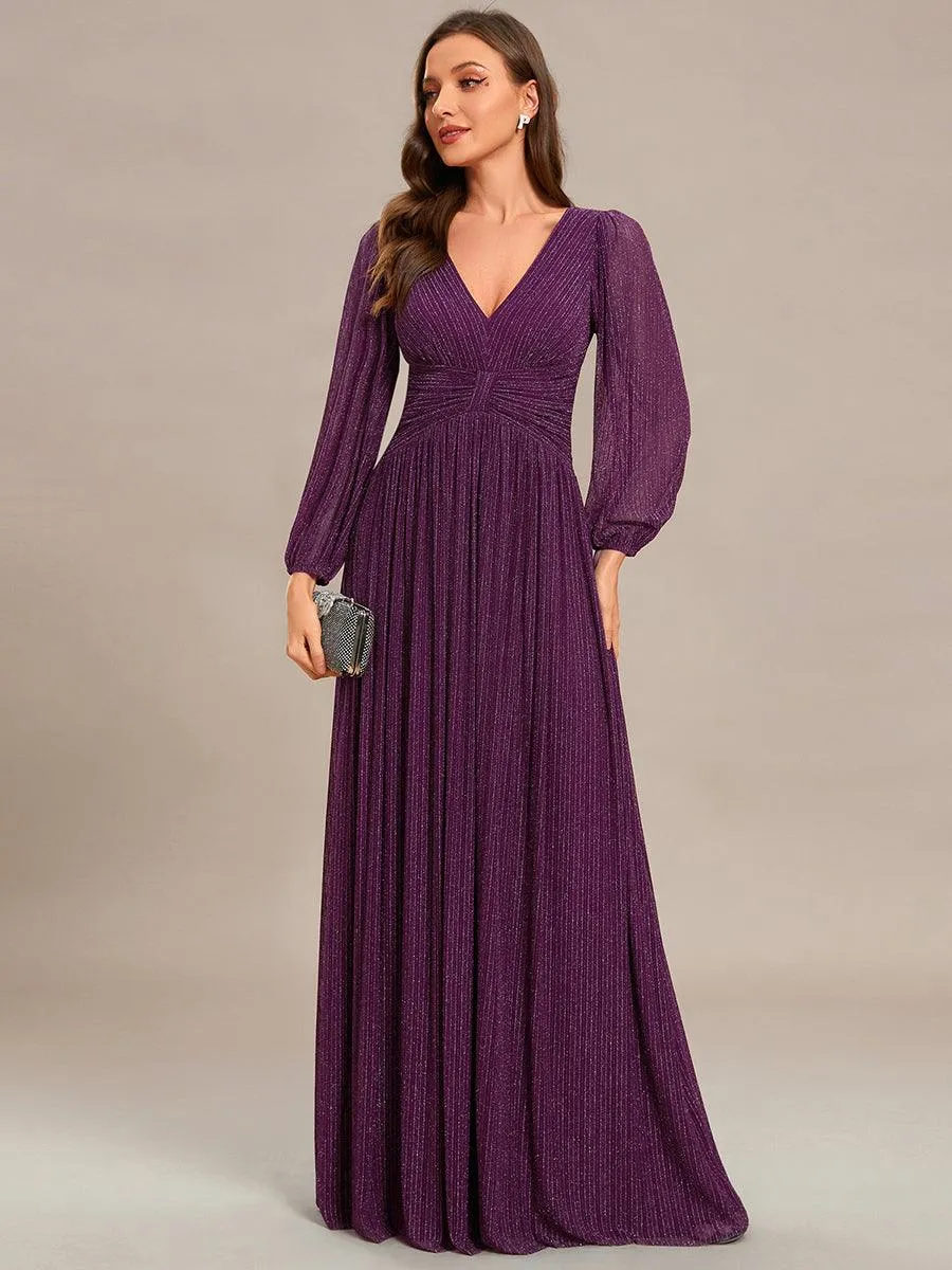 Robe de soirée trapèze à manches longues et taille empire scintillante