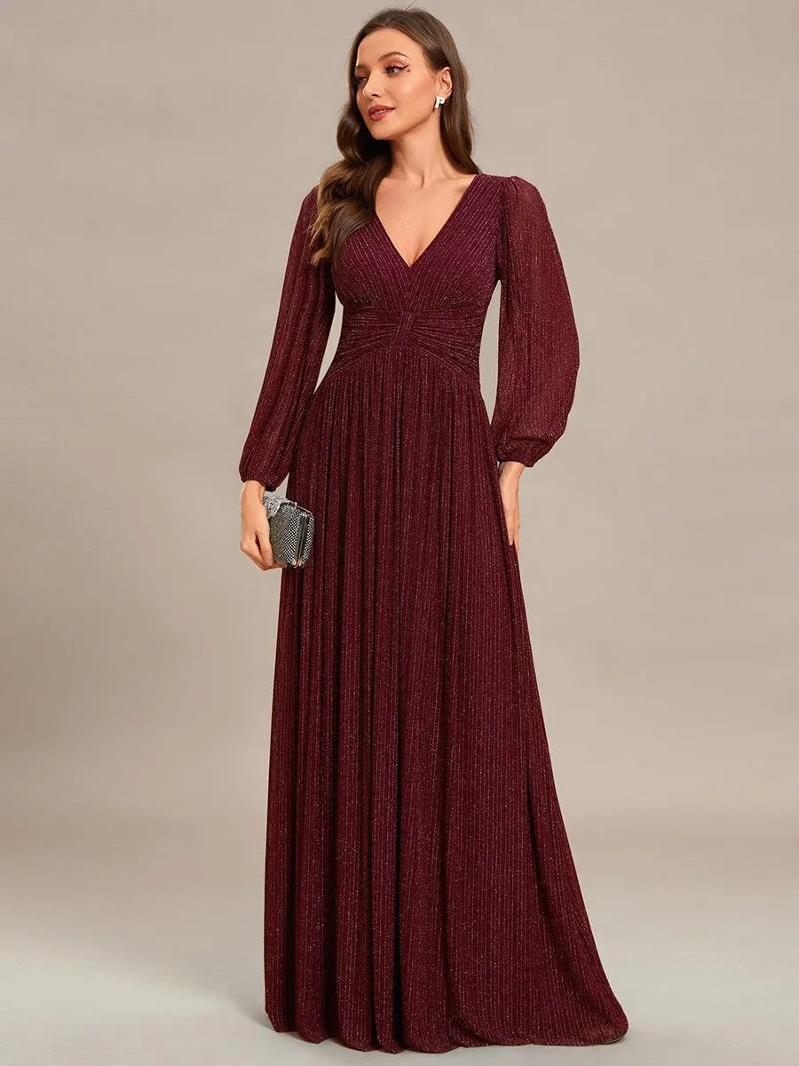 Robe de soirée trapèze à manches longues et taille empire scintillante