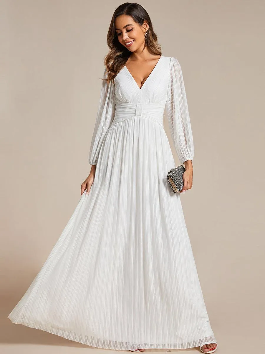 Robe de soirée trapèze à manches longues et taille empire scintillante