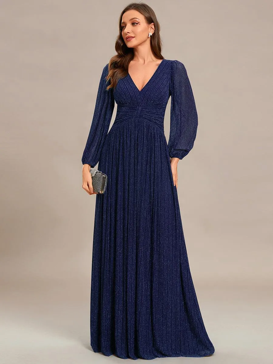 Robe de soirée trapèze à manches longues et taille empire scintillante