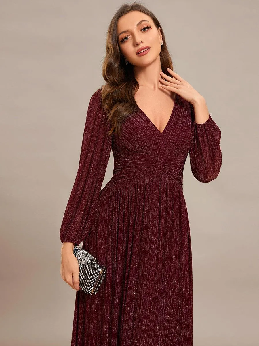 Robe de soirée trapèze à manches longues et taille empire scintillante