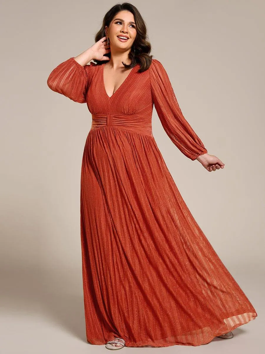 Robe de soirée trapèze à manches longues et taille empire scintillante