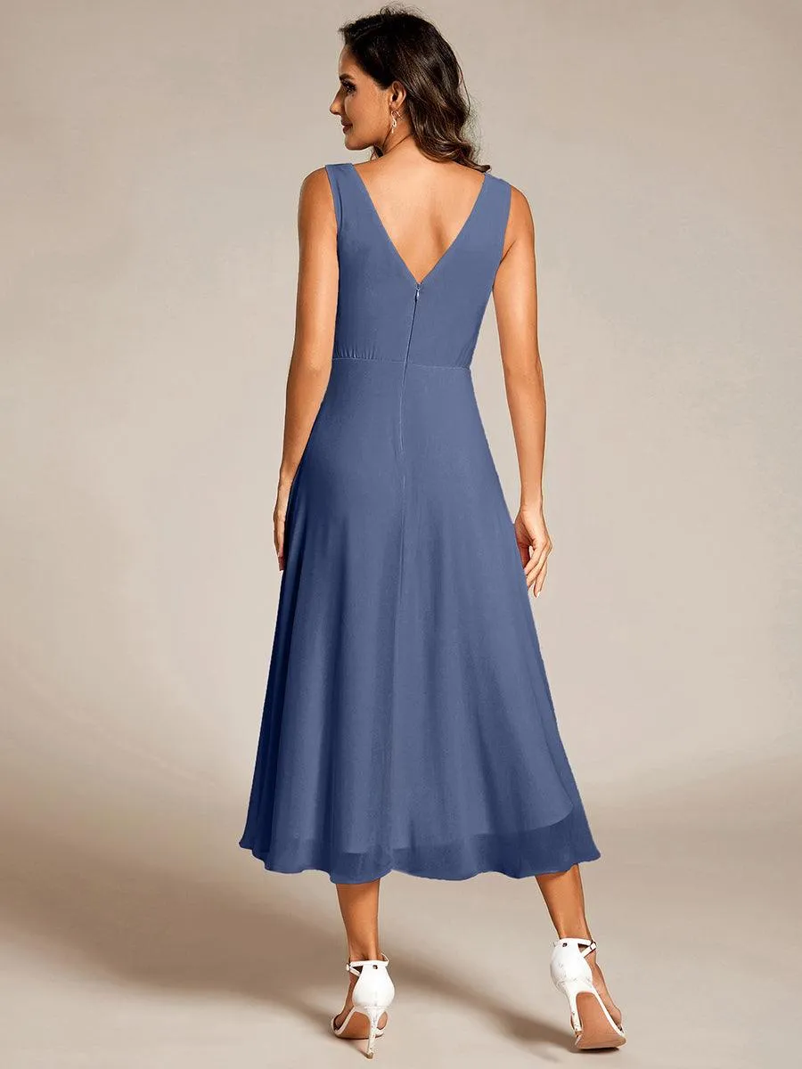 Robe d'invité de mariage élégante en mousseline de soie plissée sans manches à col en V