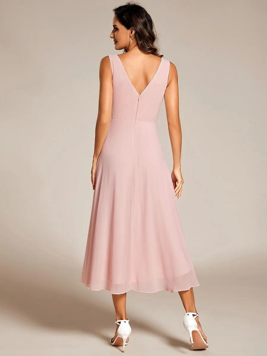 Robe d'invité de mariage élégante en mousseline de soie plissée sans manches à col en V